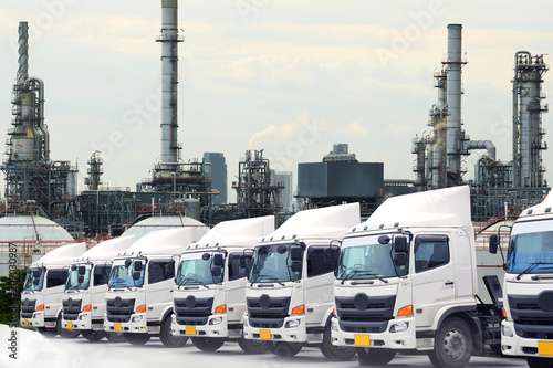 New truck fleet with Oil refinery indsutry concept. photo