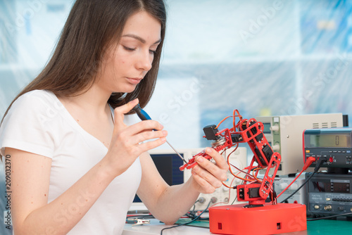 Student girl in robotics class