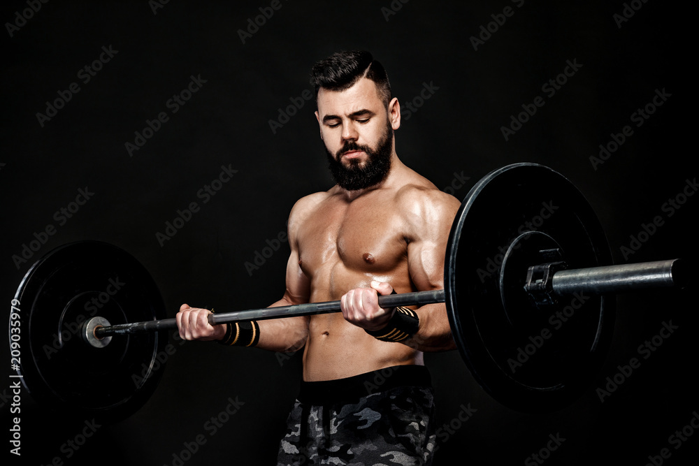 athletic muscular man workout with barbell