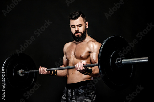 athletic muscular man workout with barbell