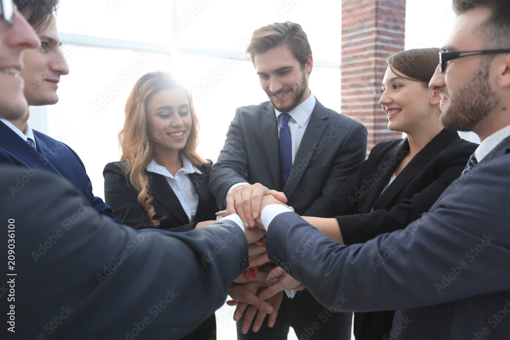 closeup.business team with hands clasped together closeup.business team with hands clasped together
