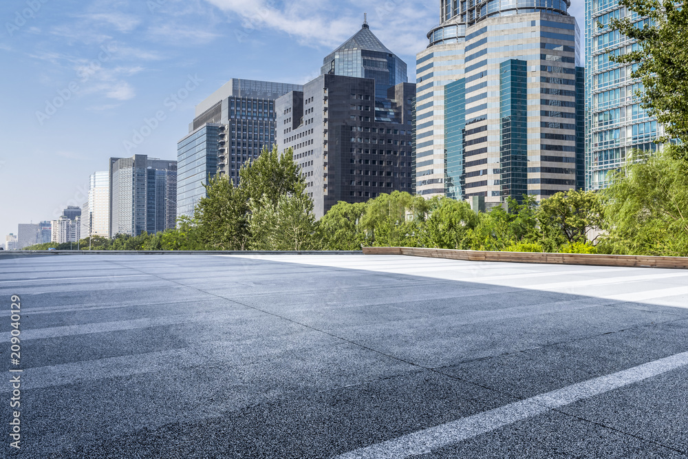 Panoramic skyline and modern business office buildings with empty road,empty concrete square floor