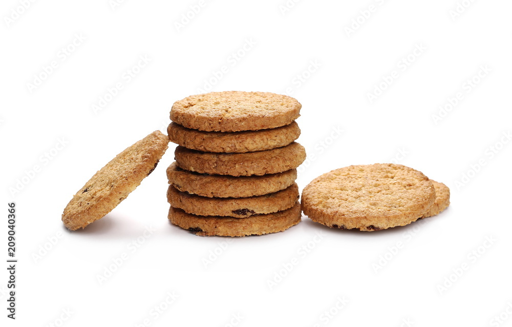 Round wholewheat biscuits with raisins isolated on white background