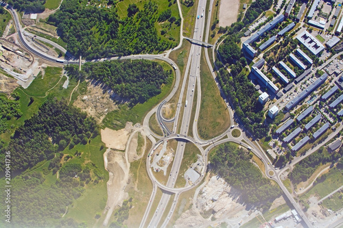 Freeway and roundabout pattern with traffic aerial photo