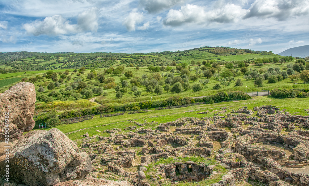Nuraghe 'Su Nuraxi' in Barumini, Sardinia, Italy. View of archeological nuragic complex of Su Nuraxi di Barumini. UNESCO World Heritage List