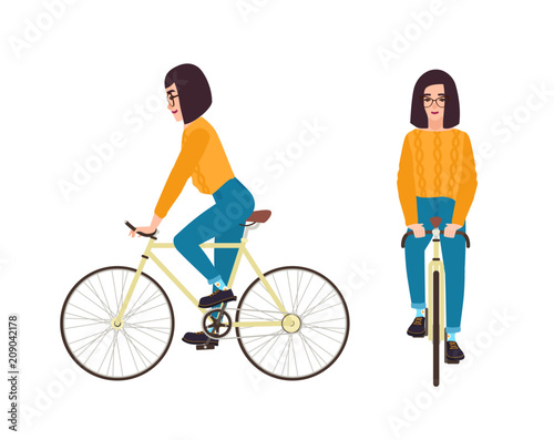 Young woman or girl dressed in casual clothing riding bike