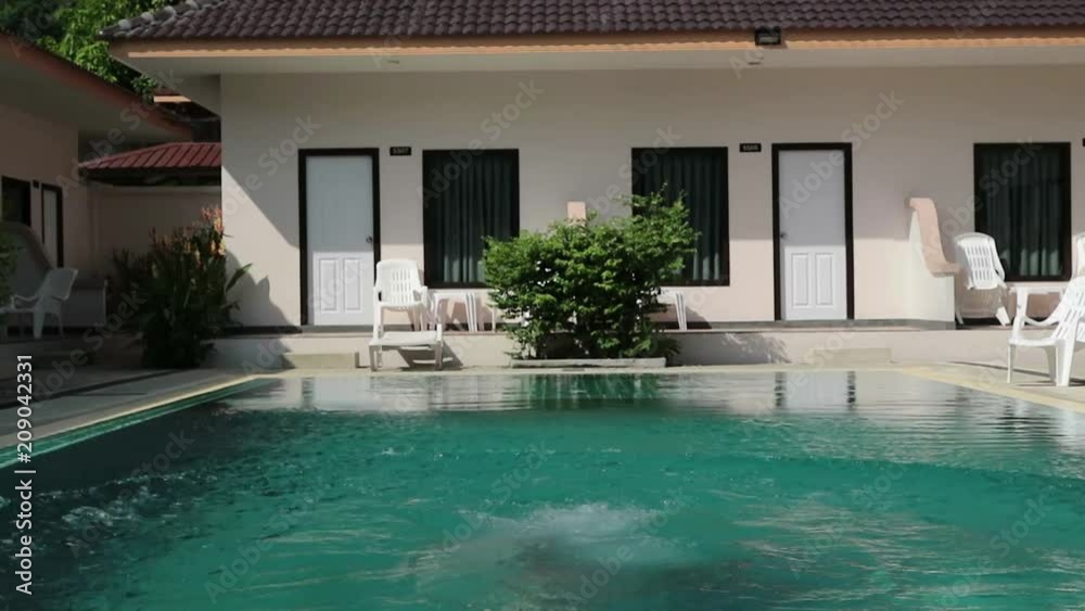 custom made wallpaper toronto digitallittle girl jumps in a swimming pool. funy time in summer holiday