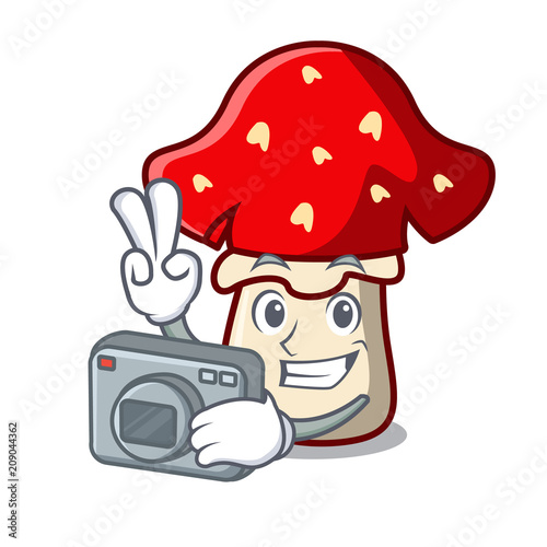 Photographer amanita mushroom mascot cartoon photo