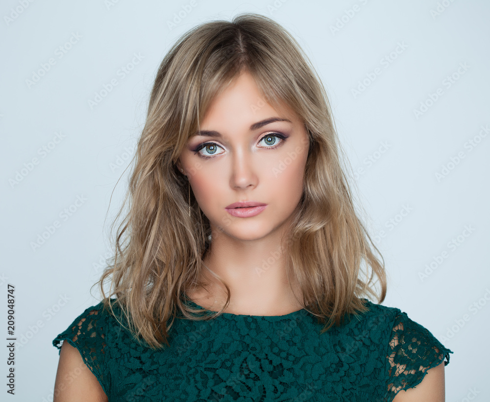 Nice young woman on white background, closeup portrait Nice young woman on white background, closeup portrait