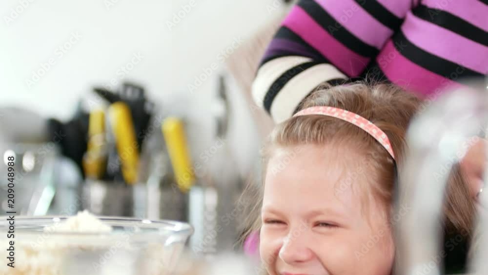 Portrait of funny little girl laughing at cooking studio Portrait of funny little girl laughing at cooking studio