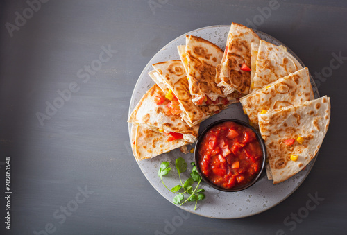 mexican quesadilla with chicken, tomato, sweet corn and cheese photo