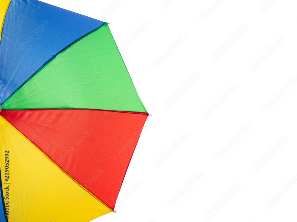 Beach umbrella multicolour, copy space on a white background Beach umbrella multicolour, copy space on a white background