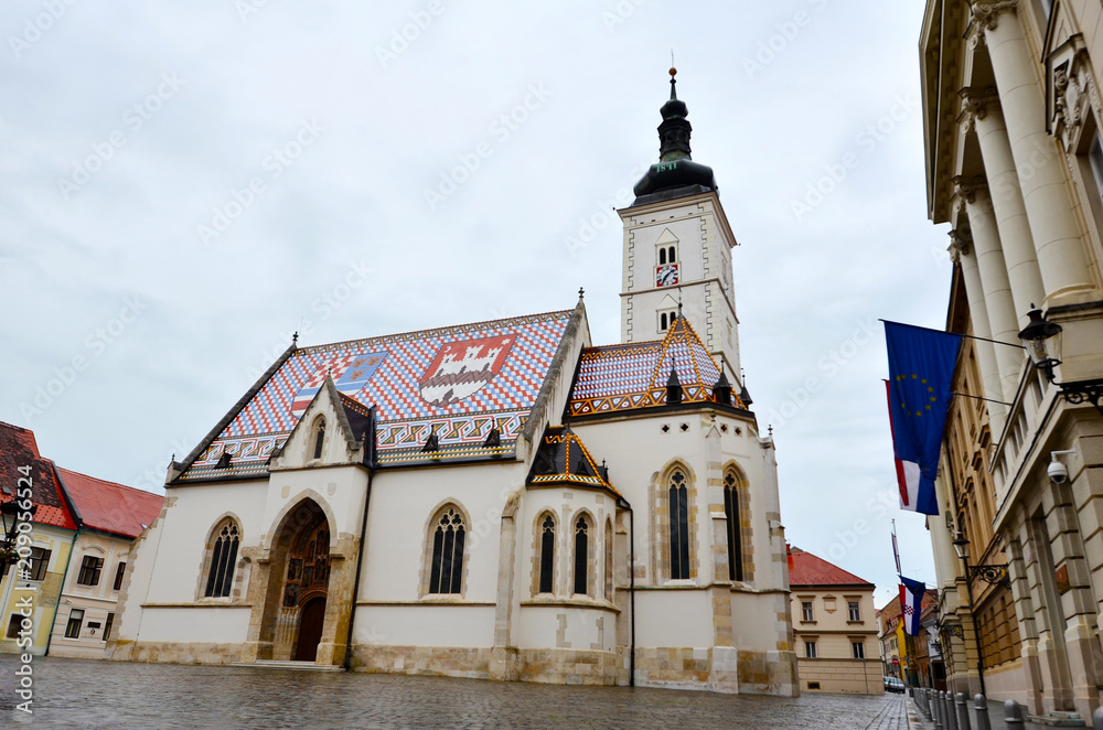 ZAGREB, CROATIA -June 9, 2016 : Church of St.Mark in St.Mark's Square in   Zagreb, Croatia in a Cloudy Day
