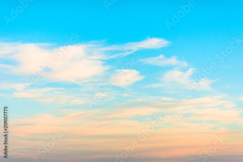 Cirrus clouds at sunset with gradient sky. © aapsky