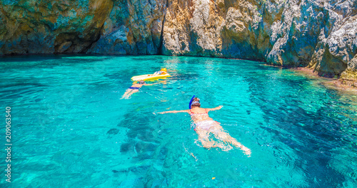 Snorkling in the blue lagoon of Palaiokastritsa, Corfu island, Greece