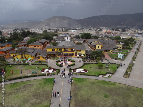 Monument Mitad del Mundo with cloudy skynear Quito in Ecuador
