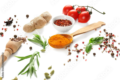 Fototapeta Naklejka Na Ścianę i Meble -  Fresh tomatoes and variety of spices on white background