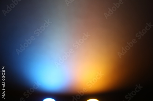 Blue and yellow rays of lig...