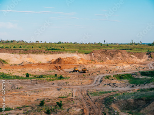 Sand quarry with bulldozer machinery
