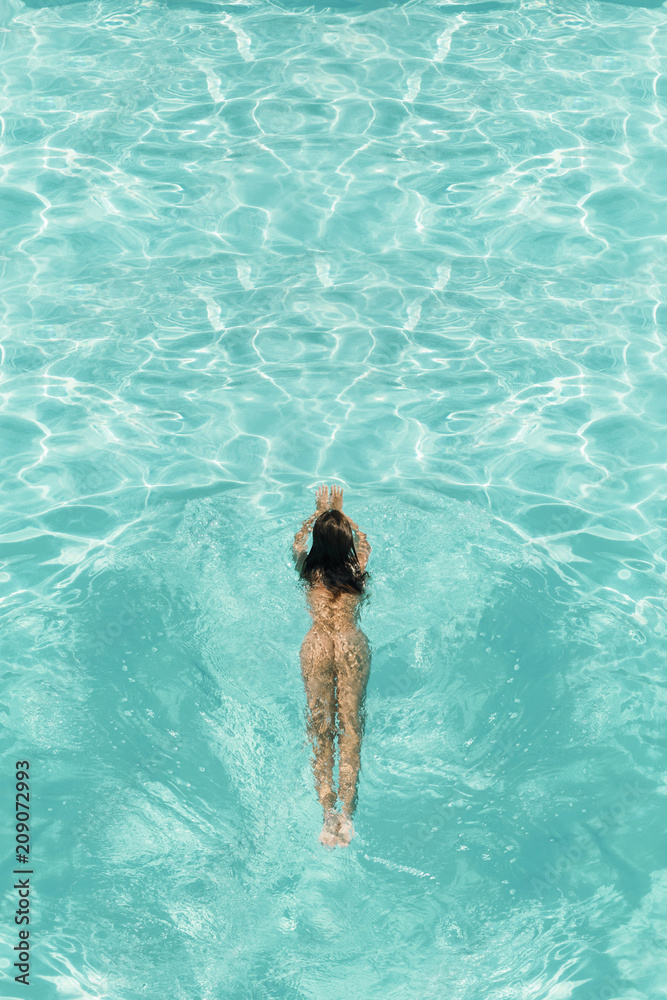 Naked Woman Swimming In Water