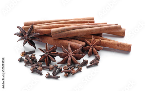 Wallpaper Mural Cinnamon sticks and spices on white background Torontodigital.ca