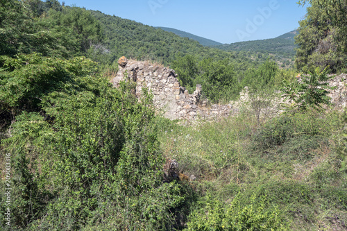 Ruins  of abandoned Palestinian village Kafr Birim in the north of Israel in which the christians Maronites lived until the middle of the 20th century photo