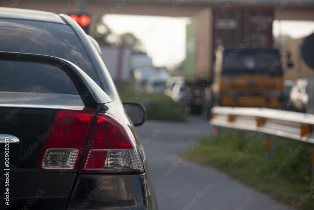 The back of the car, Traffic on the road during the light golden period, Time after work. The back of the car, Traffic on the road during the light golden period, Time after work.