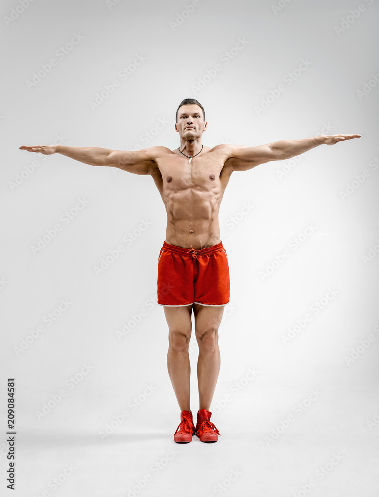 bodybuilder on gray background