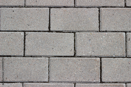 Concrete grey paving stones background 
