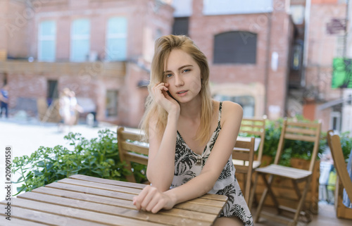 Outdoors portrait of beautiful young woman. Selective focus.