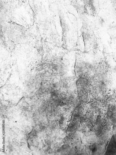 Old cement wall with crack monochrome background