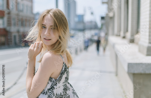 Outdoors portrait of beautiful young woman. Selective focus.