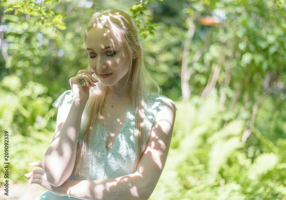 Outdoors portrait of beautiful young woman. Selective focus. Outdoors portrait of beautiful young woman. Selective focus.