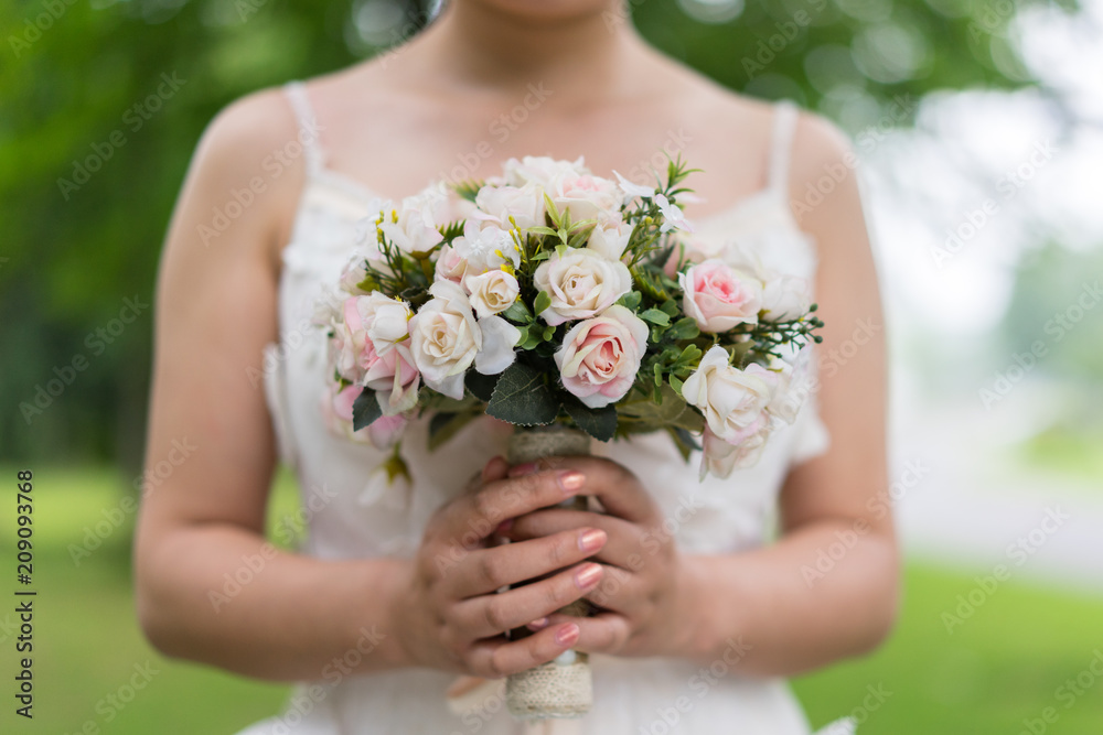 bride holding flower on wedding bride holding flower on wedding