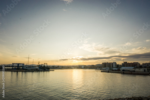 Vinaros, Spain, September 03, 2017:  Vinaros view from port in sunset. Vinaroz is  an mediterranean sea town © carles