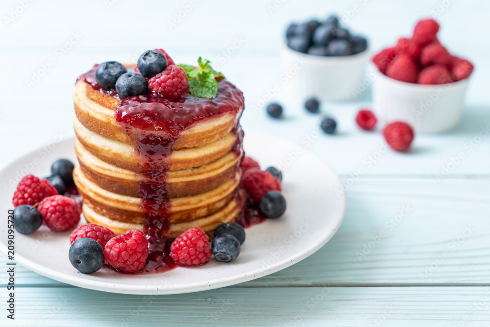 pancake with fresh raspberries and blueberries pancake with fresh raspberries and blueberries