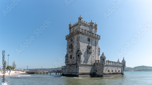 View of the Belem tower at the bank of Tejo River in Lisbon, Portugal photo