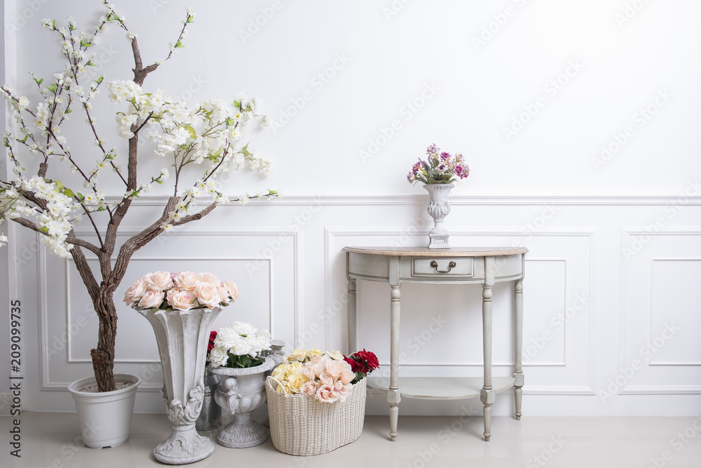 Elegant interior decoration with flowers on  white wedding background - obrazy, fototapety, plakaty 