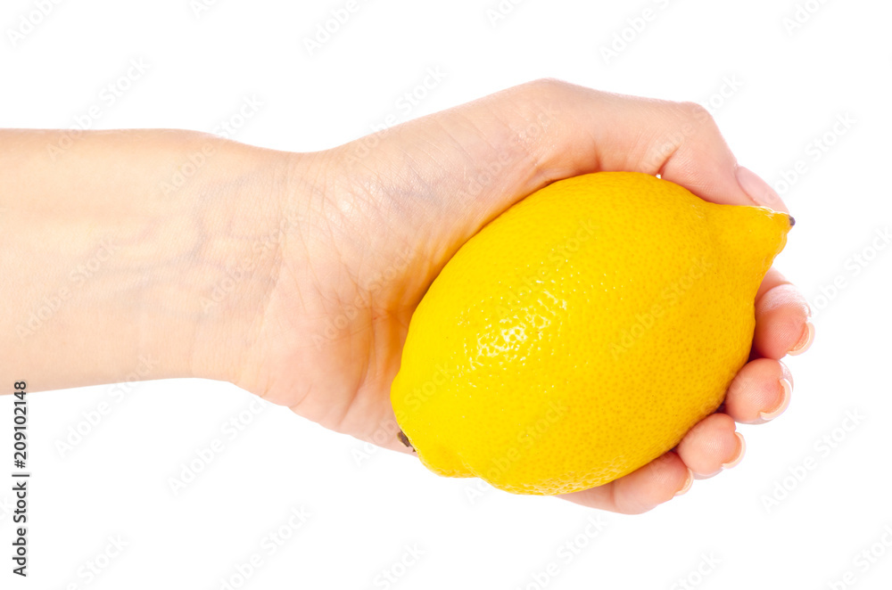 Lemon in hand on a white background isolation Lemon in hand on a white background isolation