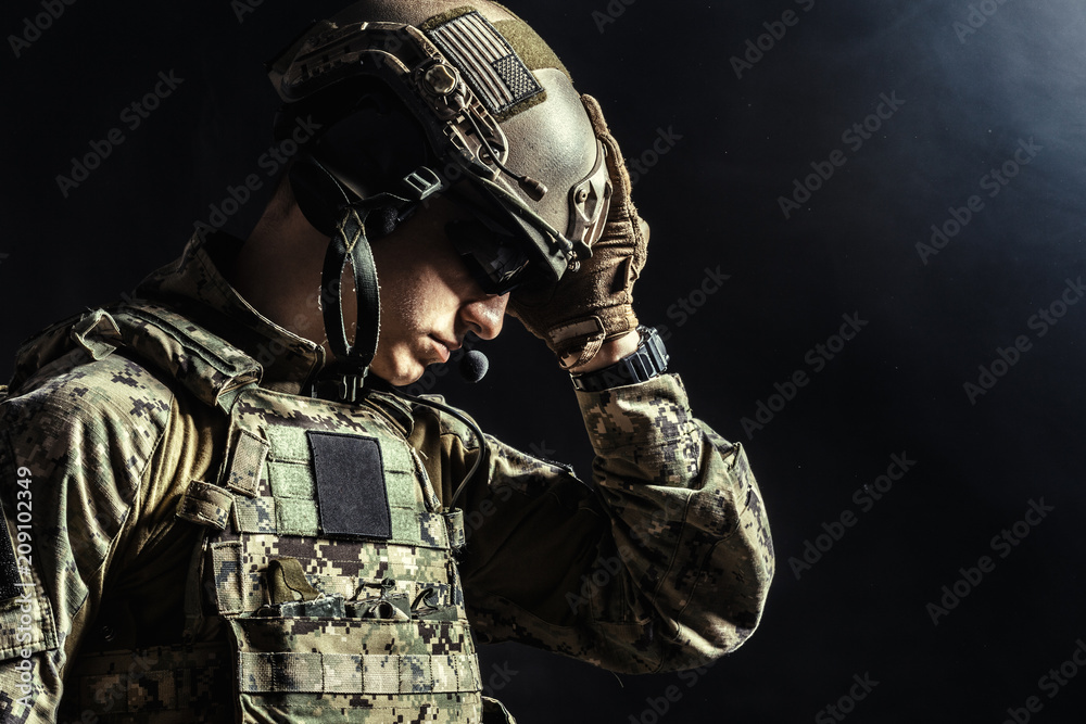 Special forces soldier with rifle on dark background Special forces soldier with rifle on dark background