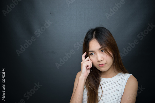Business woman think for ideas isolate on black background,Thailand people,Secretary girl thinking concept