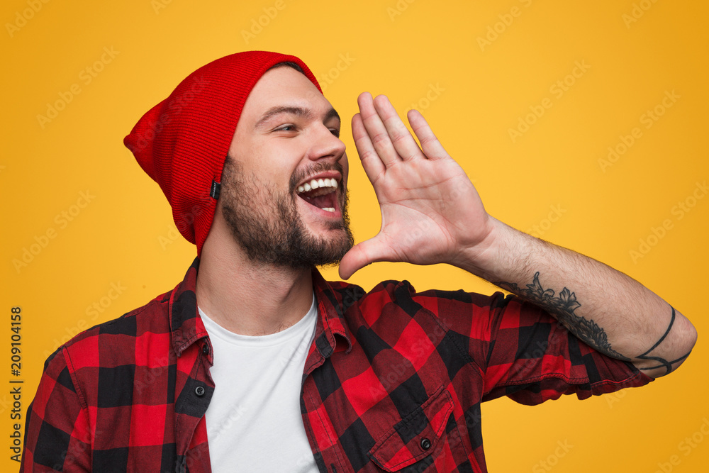 Cheerful hipster telling news Cheerful hipster telling news