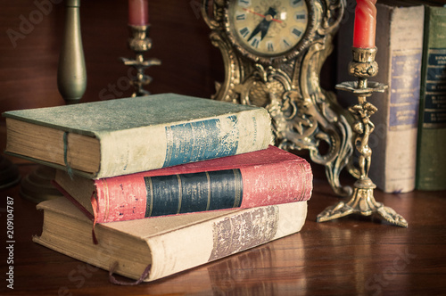  Old books with historical clocks photo