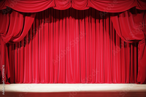 The interior of the old theater with red velvet curtains