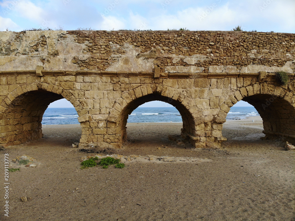 Aqueduct on the beach in Caesarea