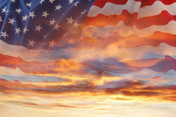 U.S.A. American flag stars and stripes in sunny sky