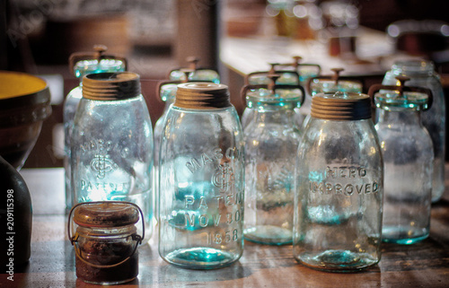 Vintage glass jars with blurred background
