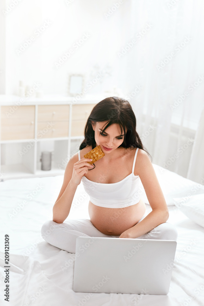 Online Shopping. Pregnant Woman Shopping In Internet Online Shopping. Pregnant Woman Shopping In Internet