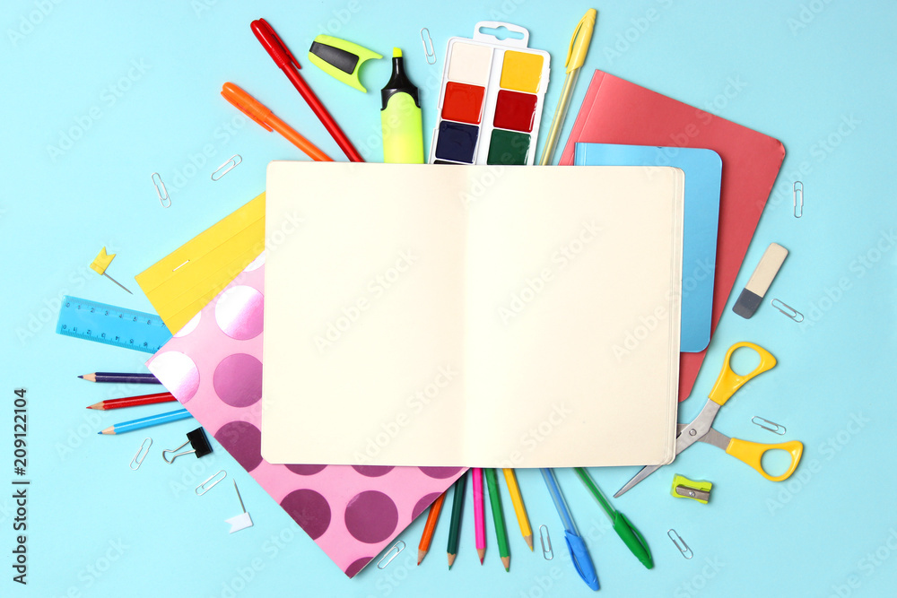 Fototapeta premium set of stationery on a colored background with space for text. back to school. office tools. flat lay, top view