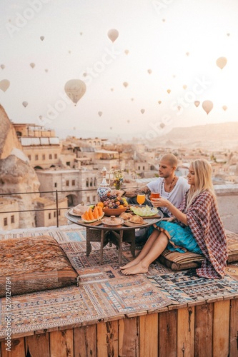 Romantic couple having breakfast in Cappadocia photo